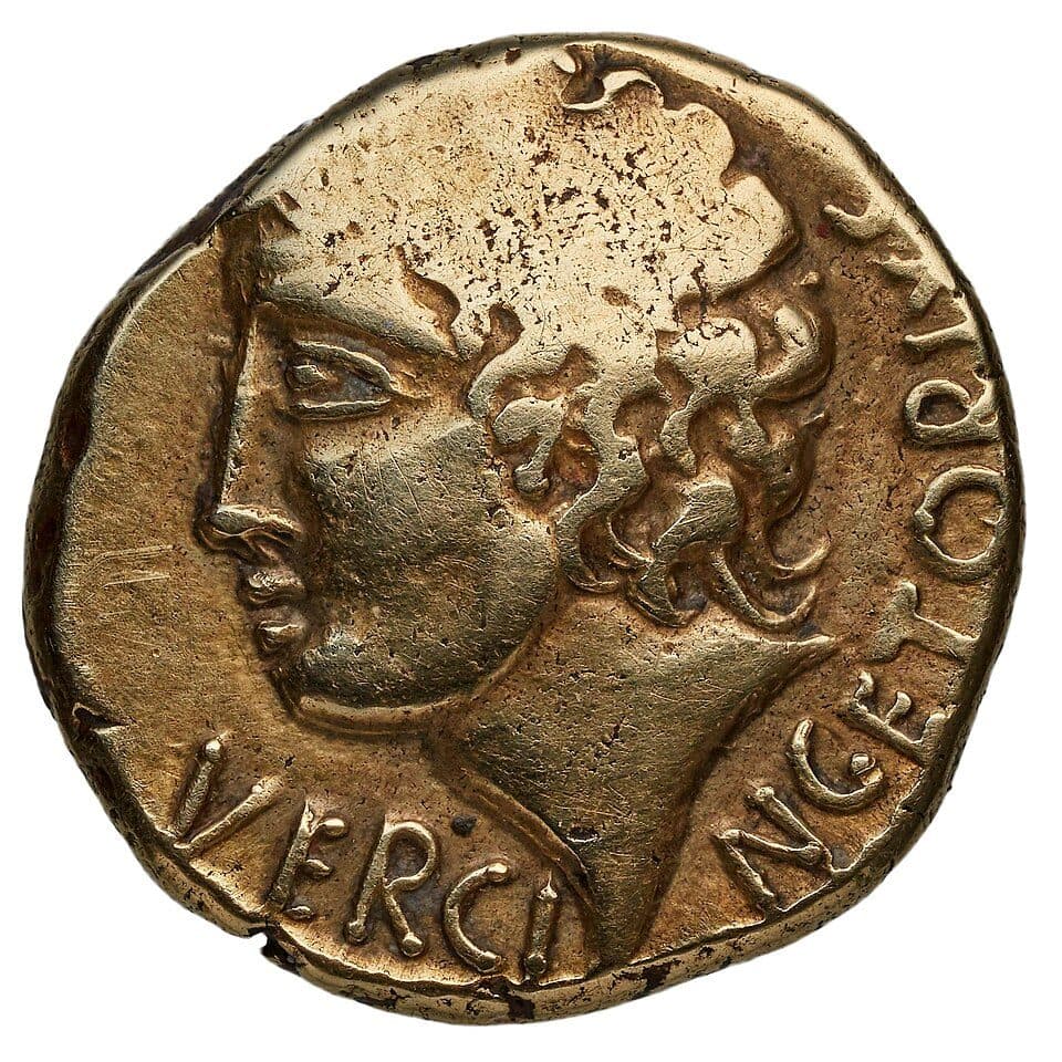 Obverse of a stater: a stylised head in profile, ringed by the legend VERCINGETORIXS